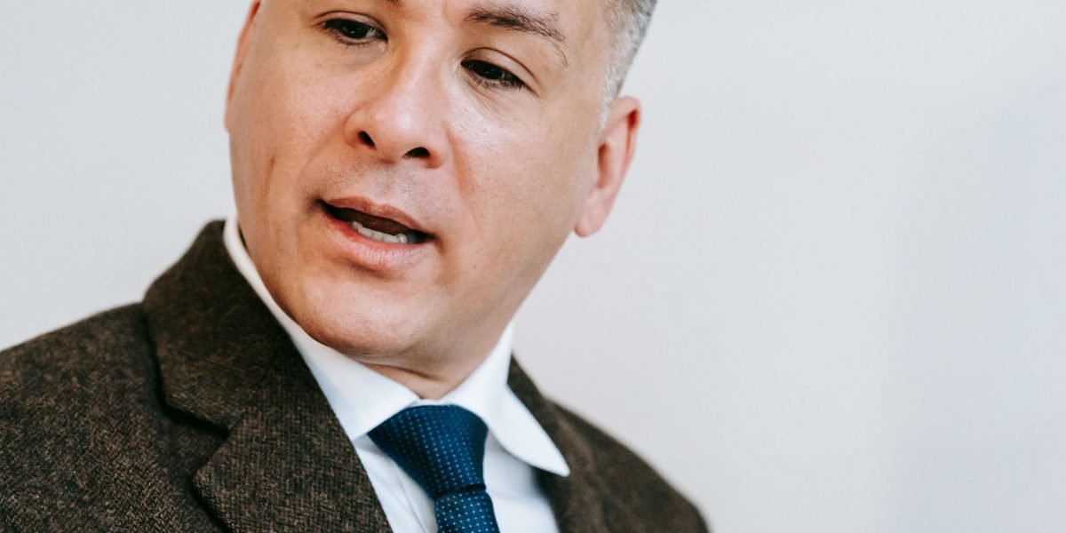 An advisor explains complex concepts, guiding clients through exclusive off-plan opportunities.