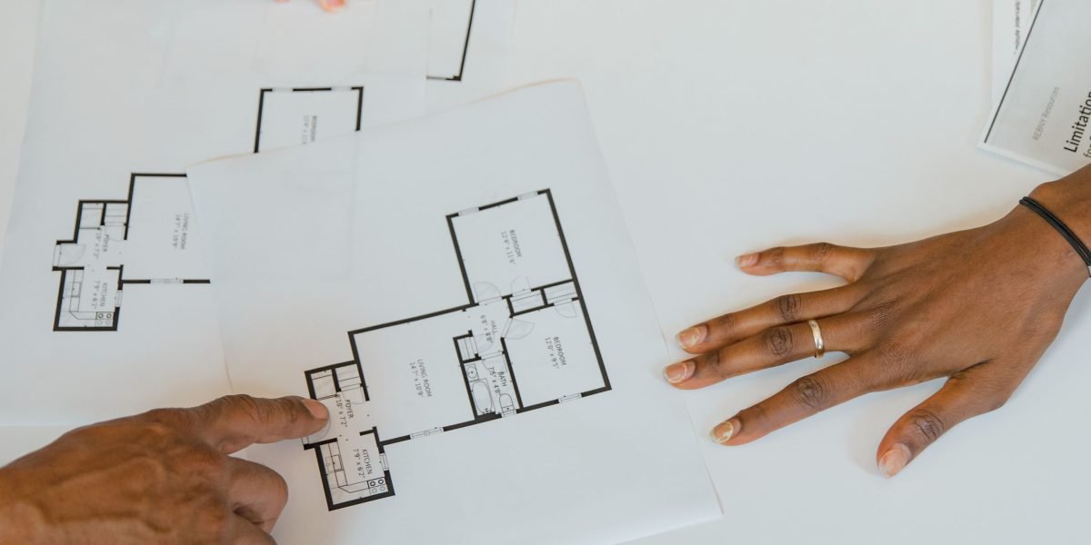 A team collaborating on a development project, symbolizing the effort behind luxury real estate.