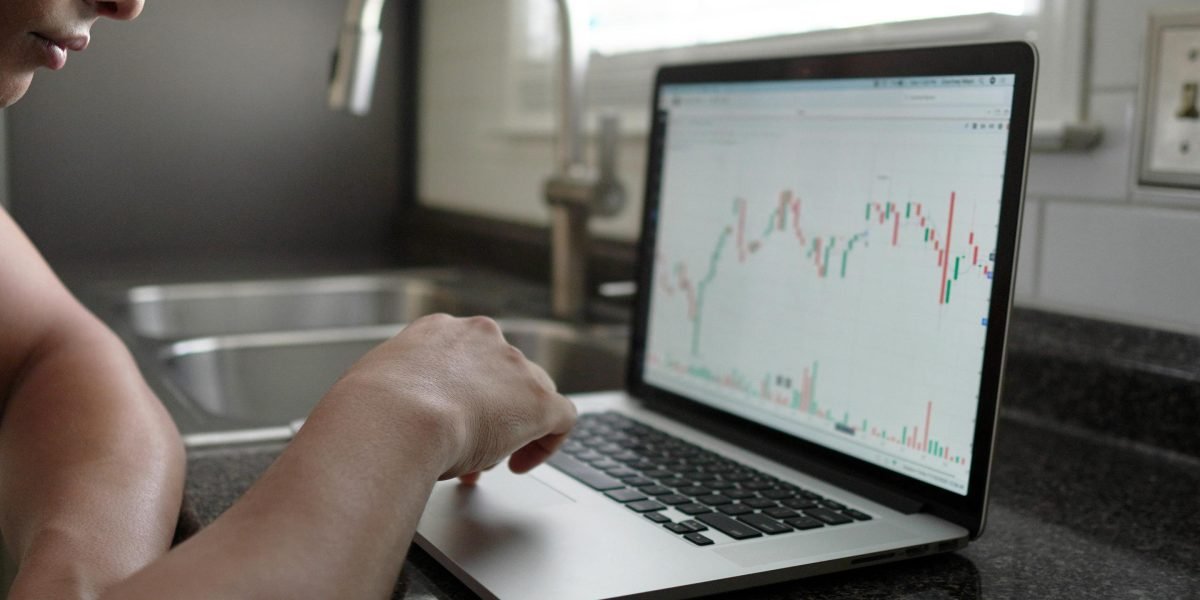 A market analyst reviewing property data and trends to inform investment decisions.