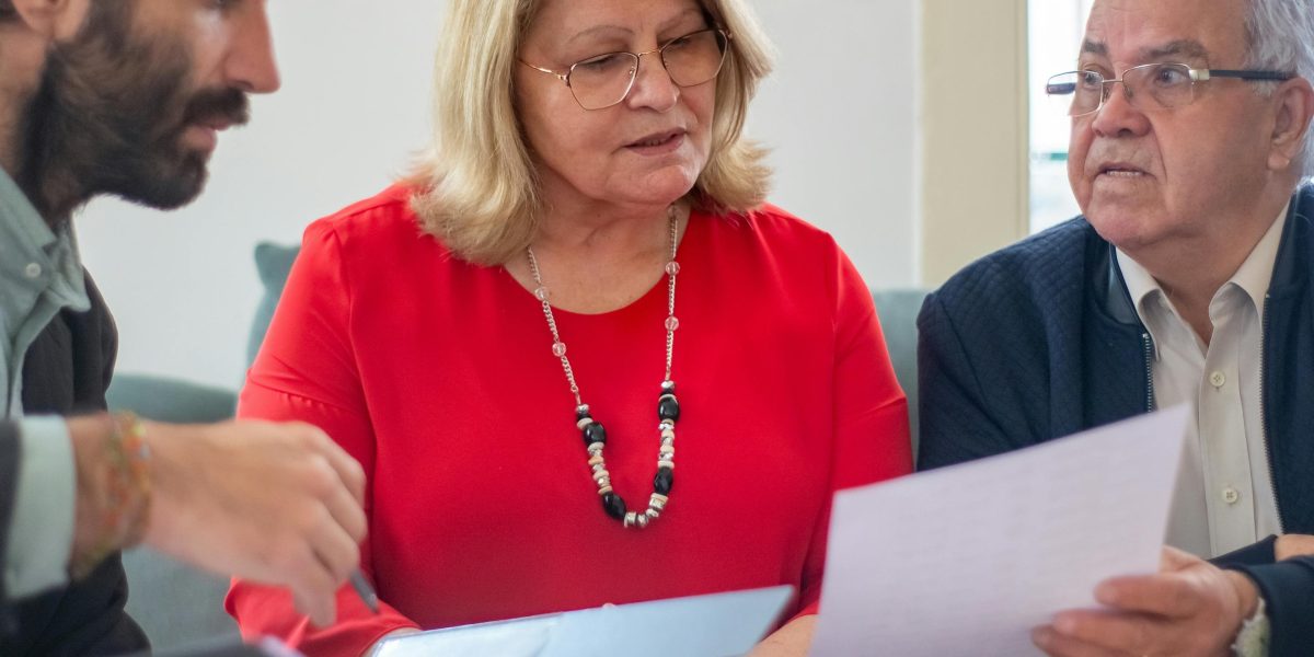 An expert real estate advisor guiding clients through complex legal documents and ownership structures.