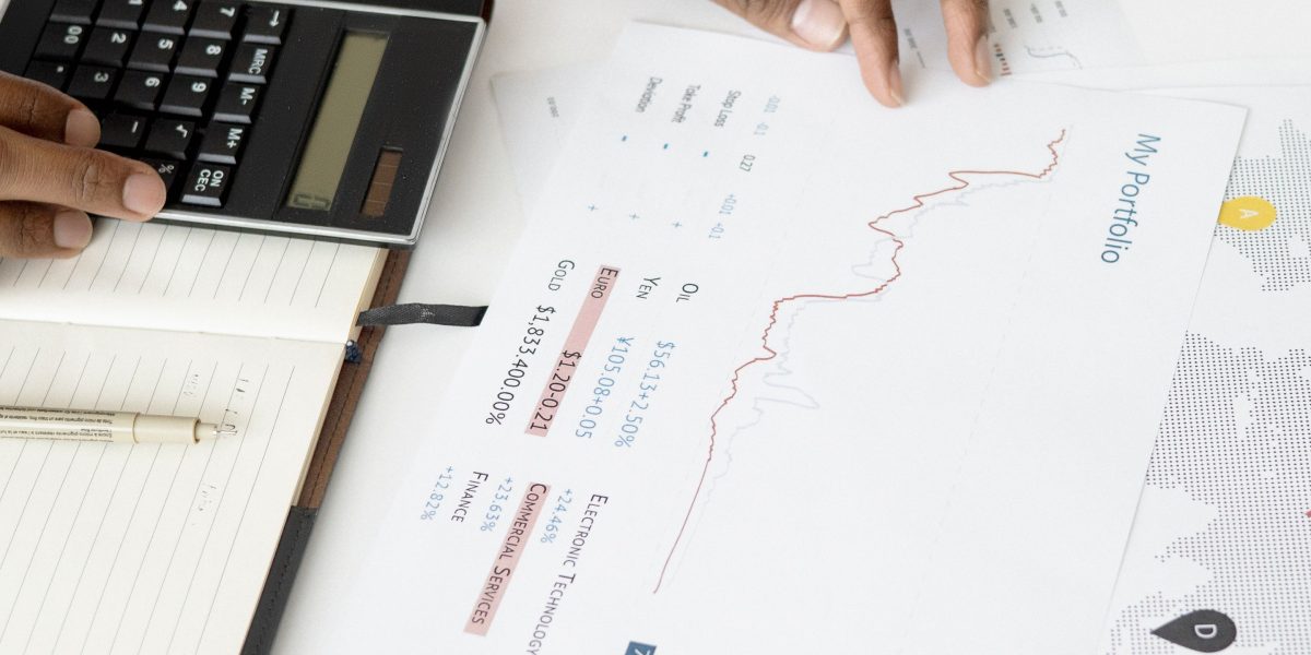 A high-net-worth investor confidently reviewing investment documents, symbolizing diligent market research.