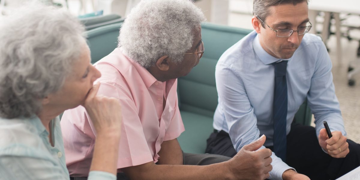A real estate advisor providing personalized guidance to a client, emphasizing expert support for property investments.