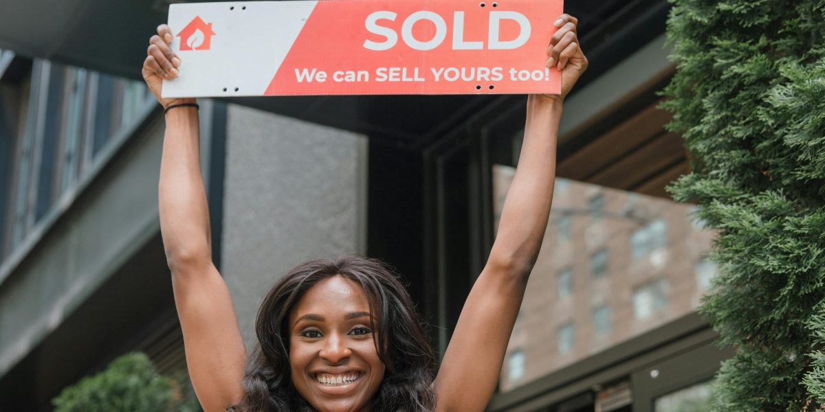 A confident professional, smiling, celebrates a significant achievement or successful deal in a business setting.