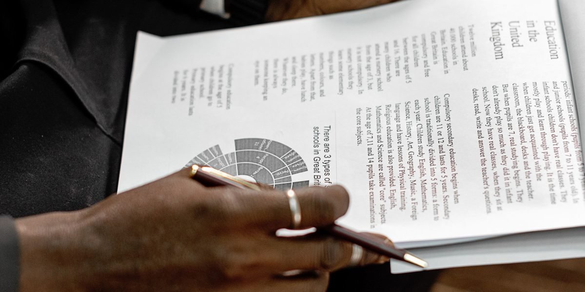 An investor diligently reviews data and reports to anticipate market shifts and protect their assets.