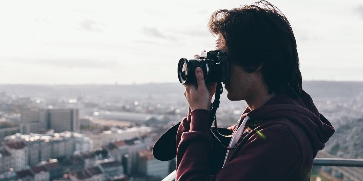 A person enjoying a luxurious city view, symbolizing high-net-worth lifestyle and smart investment.